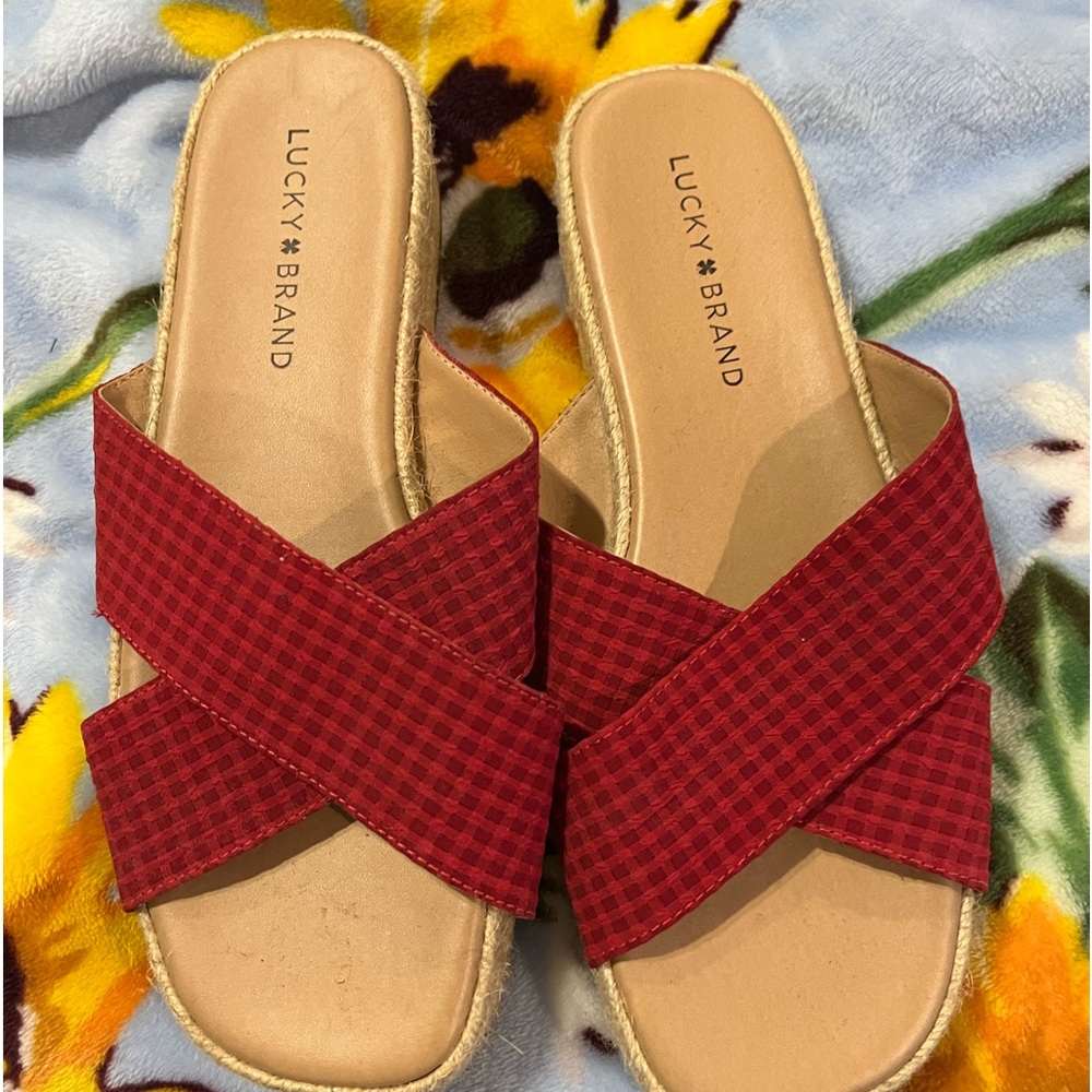 Lucky brand red criss cross sandals. New. Size 8.